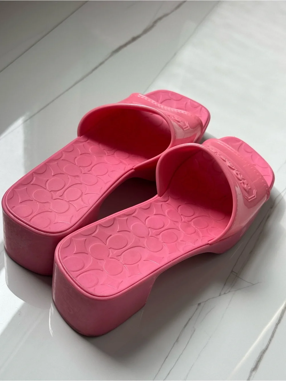 Coach Pink Slide Mules with Embossed Logo Strap